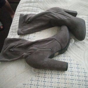 A pair of Grey Sueade boots size 6 only worn twice